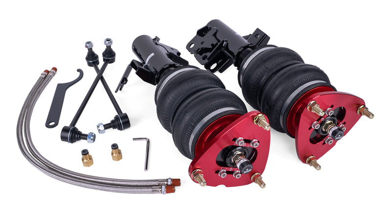 A pair of red and black Air Lift Performance air suspension shocks with double bellow air bags, 2 braided air hoses and installation fittings.