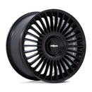 Rotiform multispoke flat face vehicle wheel in a matte black finish with black and silver Rotiform logo center cap.