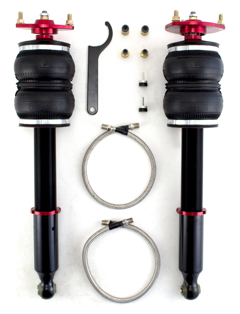 A pair of Air Lift Performance red accented monotube struts with double bellows progressive rate air springs with red anodized aluminum upper mount. Braided stainless steel leader hoses and fittings. Air suspension kit part