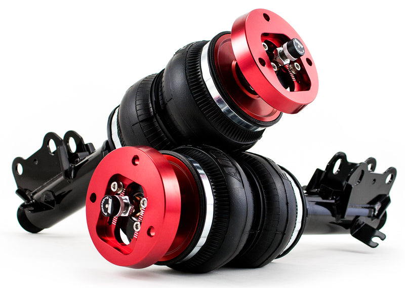 A pair of Air Lift Performance red accented threaded body air-over shocks with double bellows progressive rate air springs with adjustable camber plates and black powdercoated mounting brackets.Part