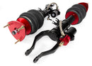 A pair of Air Lift Performance red accented monotube struts with independent adjusters for compression and rebound damping as well as piggyback style nitrogen canisters, and compact double bellows progressive rate air springs.  Air suspension kit part