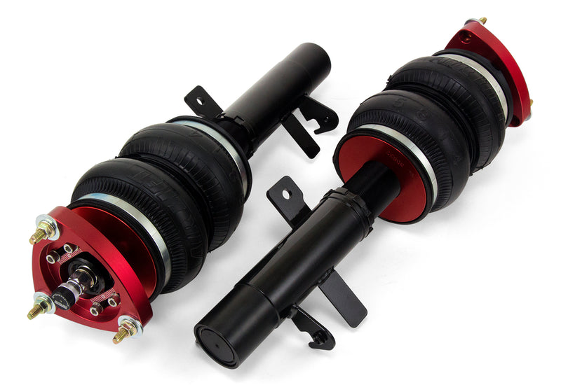 A pair of Air Lift Performance red accented threaded monotube struts with double bellows progressive rate air springs with bolt-in camber plates.  Air suspension kit part