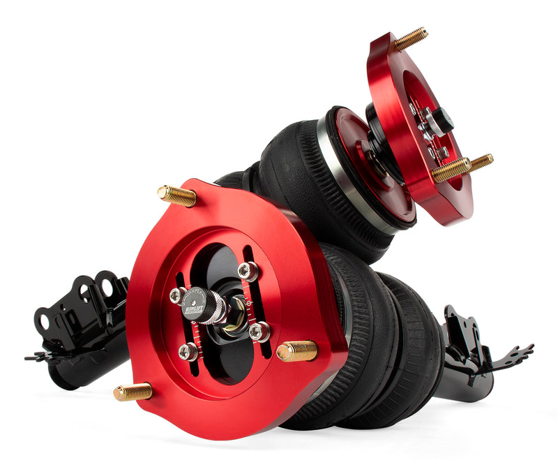 A pair of Air Lift Performance red accented monotube struts with double bellows progressive rate air springs with bolt-in camber plates and powdercoated gloss black steel mounting brackets.   Air suspension kit
