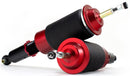 A pair of Air Lift Performance red accented threaded body air-over shocks with progressive rate sleeve-style air springs. Air suspension kit part