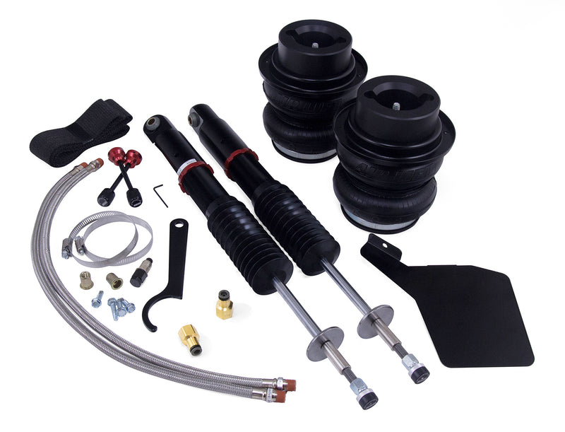A pair of Air Lift Performance red accented high performance monotube shocks with double bellows progressive rate air springs with roll plates, braided stainless steel leader hoses and fittings. Air suspension part