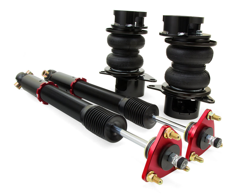 A pair of Air Lift Performance red accented monotube struts with double bellows progressive rate air springs, roll plates and powdercoated gloss black steel brackets. Air suspension kit part
