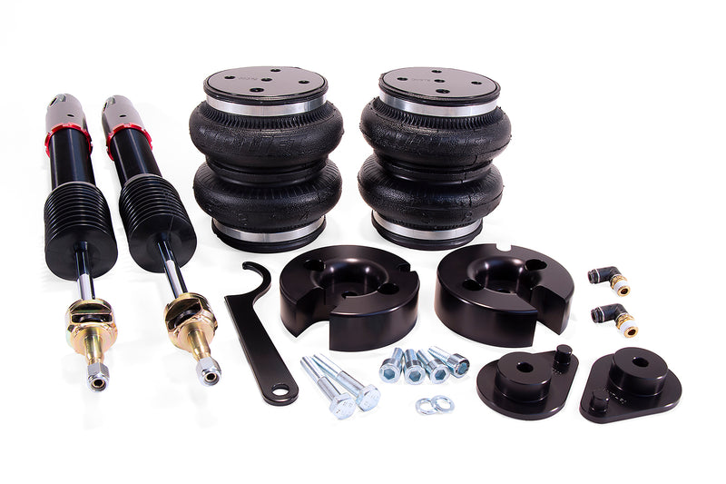 A pair of Air Lift Performance red accented high performance monotube shocks with double bellows progressive rate air springs with powdercoated gloss black steel mounting brackets and mounting hardware. Air suspension kit part