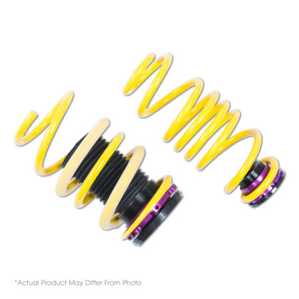 2 yellow vehicle suspension height adjustable springs with end height threaded adjusters installed