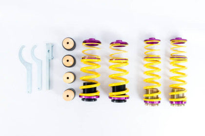 4 yellow vehicle suspension height adjustable springs with end fittings and installation tools