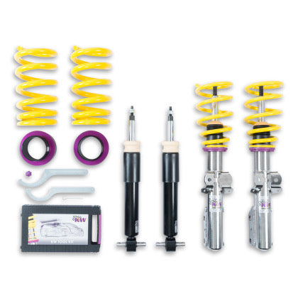 2 assembled vehicle suspension chrome coilovers with yellow springs, 2 black coilover bodies, 2 yellow rings and purple sittings, 2 coilover adjustment tools and storage box.