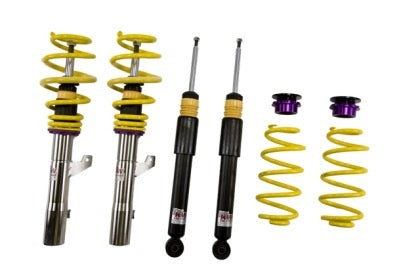 2 chrome vehicle suspension coilovers with yellow springs, 2 black coilovers, 2 yellow springs and 2 purple end cap fittings.