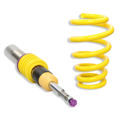 1 chrome body coilover with yellow spring and purple accented fittings, and additional yellow spring.