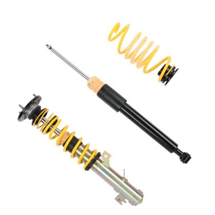 One adjustable coilover, one unsleeved coilover strut and yellow lowering spring