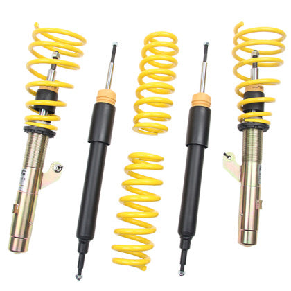 Coilover suspension kit with two assembled coilovers overs, two unassembled struts and two springs