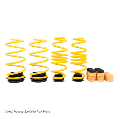 Four yellow suspension lowering springs
