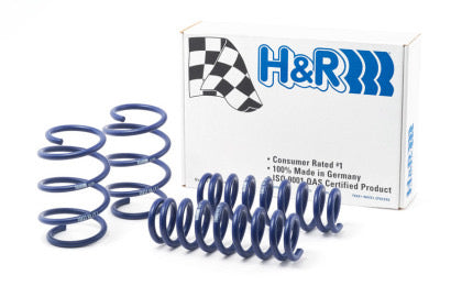 H&R product box with 4 vehicle lowering springs laid out to the front