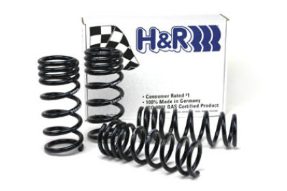 H&R Springs product box and 4 vehicle suspension black lowering springs