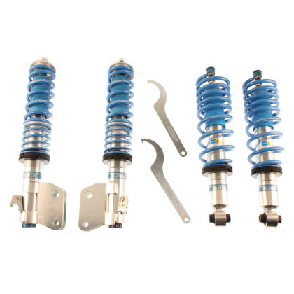 4 Bilstein zinc plated vehicle suspension coilovers with fitted blue strut sleeve and fitted blue springs, 2 coilover adjustment tools.