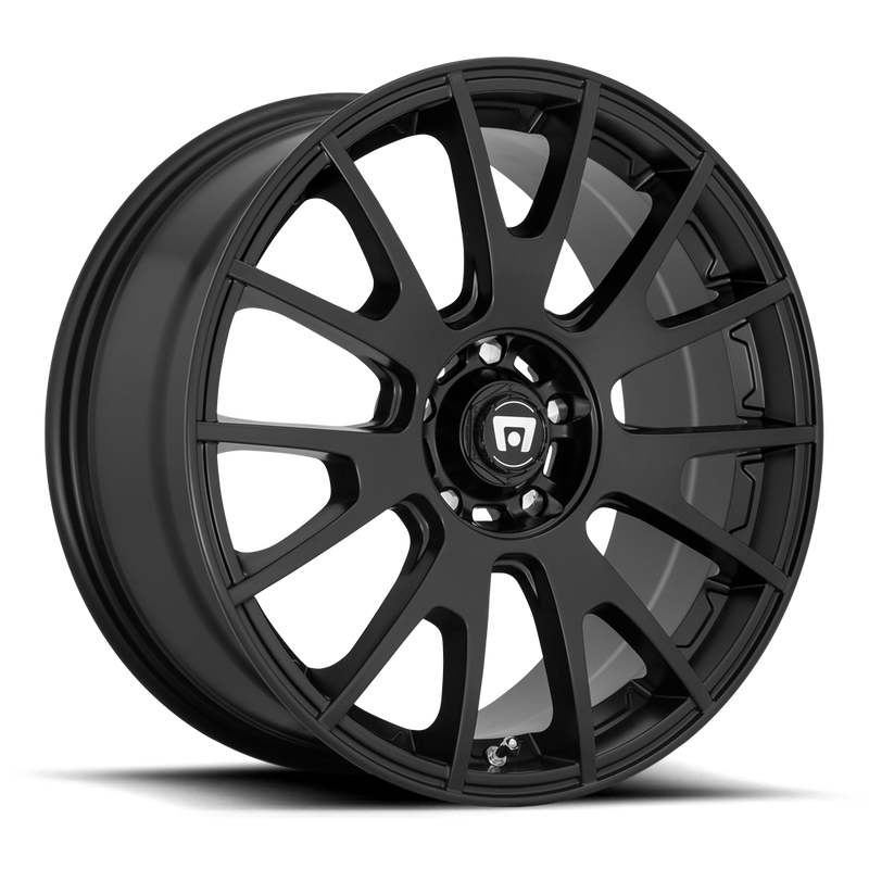 Motegi Racing MS7 cast aluminum 7 fork spoke design automotive wheel in matte black with Motegi silver logo center cap.