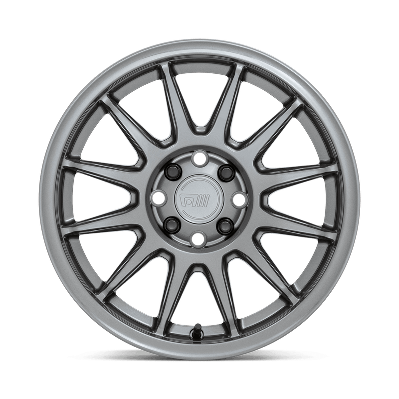 Front face view of a Motegi S12 cast aluminum 12 spoke automotive wheel in a gloss gunmetal finish with Motegi Racing logo center cap.