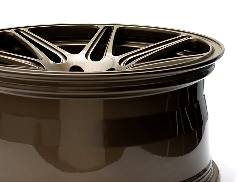 Side profile of a Neuspeed 7 double spoke automotive alloy wheel in a gloss bronze finish.