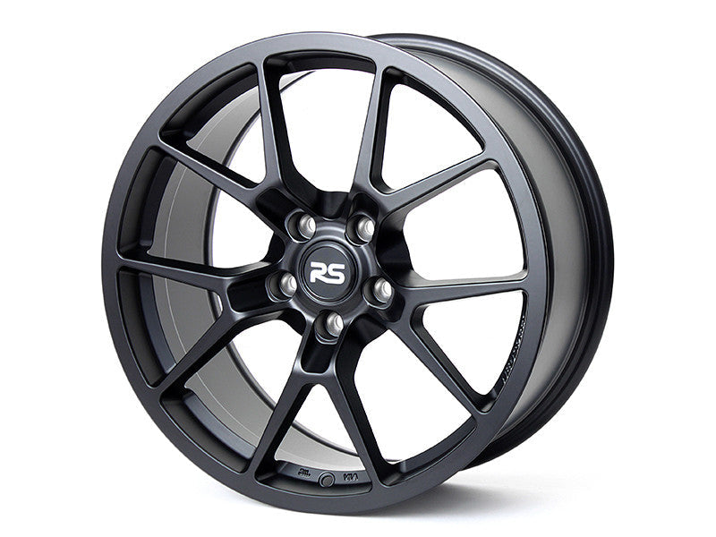 Neuspeed split 5 spoke automotive alloy wheel in a satin black finish with an RS logo center cap.