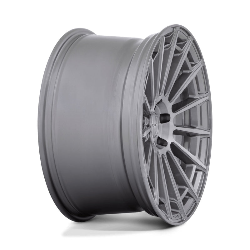 Side view of a Niche Amalfi monoblock cast aluminum 15 spoke automotive wheel in a platinum finish with an embossed Niche logo on the outer lip and a Niche logo center cap.