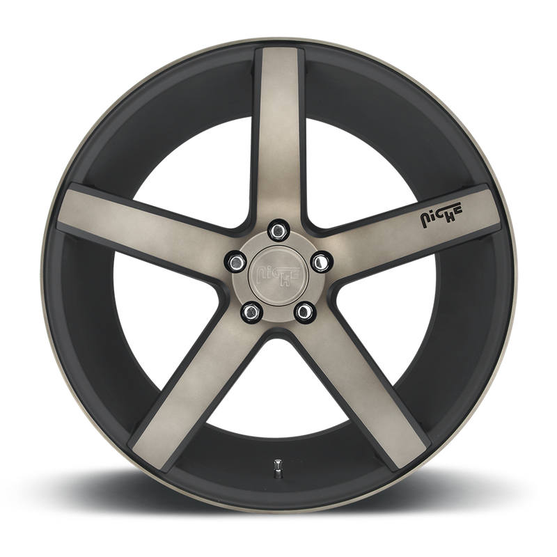 Front face view of a Niche Milan monoblock cast aluminum 5 spoke automotive wheel in a matte black machined double dark tint finish with an embossed Niche logo in one spoke and a Niche silver logo center cap.