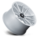 Tilted side view of a Rotiform BTL cast aluminum 5 double spoke design automotive wheel in a gloss silver finish with a machined face and a black center cap with a silver Rotiform logo.