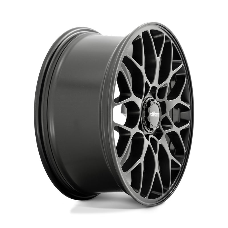 Side view of a Rotiform SGN monoblock cast aluminum 10 spoke automotive wheel in a matte black finish with a black center cap with a silver Rotiform logo.