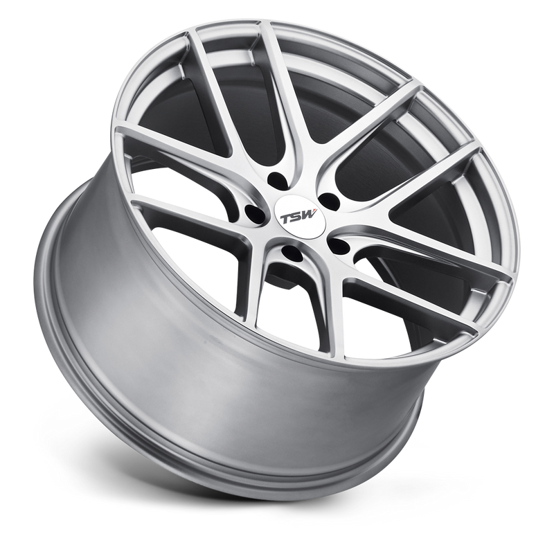 Tilted Side View Of A TSW Geneva 1 Piece Rotary Forged Aluminum, 5 Double Spoke Automotive Wheel In A Matte Titanium Silver Finish With A TSW Logo Center Cap.