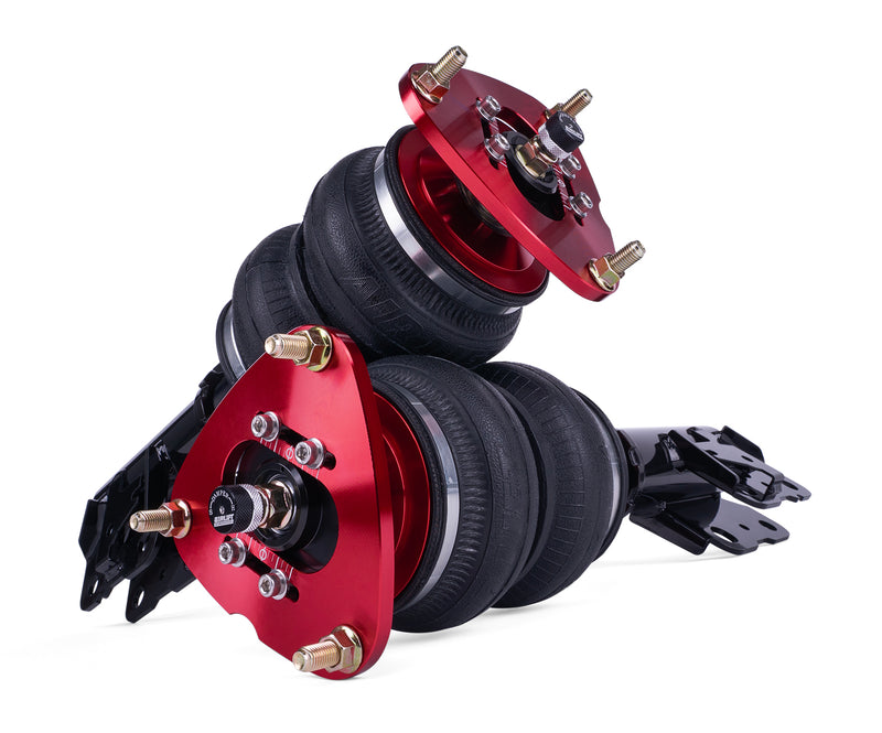 A pair of Air Lift Performance red accented threaded body air-over shocks with progressive rate double bellows air bags