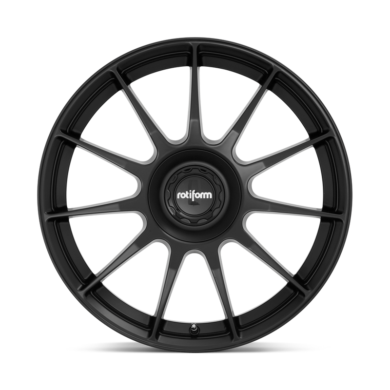 Front face view of a Rotiform DTM monoblock cast aluminum 11 spoke automotive wheel in a satin black finish with a Rotiform black center cap having a silver Rotiform logo.