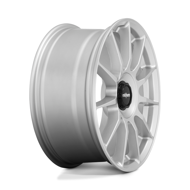 Side view of a Rotiform DTM monoblock cast aluminum 11 spoke automotive wheel in a silver finish with a Rotiform black center cap.