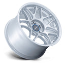 Tilted side view of a Motegi model Tsubaki in silver with a machined lip and Motegi logo center cap
