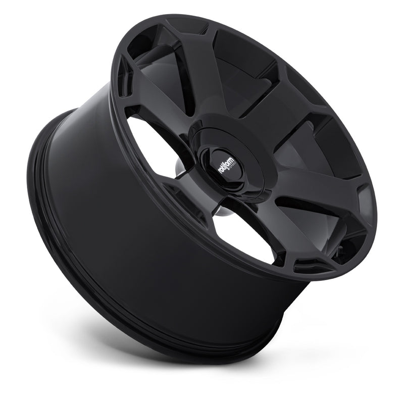 Tilted side view of a Rotiform model AVS automotive wheel in gloss black