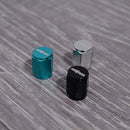 3 Rotiform tire valve caps in teal, silver and black