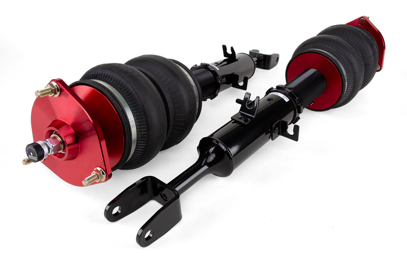 A pair of Air Lift Performance anodized red aluminum accented monotube struts with double bellows progressive rate air springs with powdercoated gloss black steel mounting brackets.  Air suspension part kit