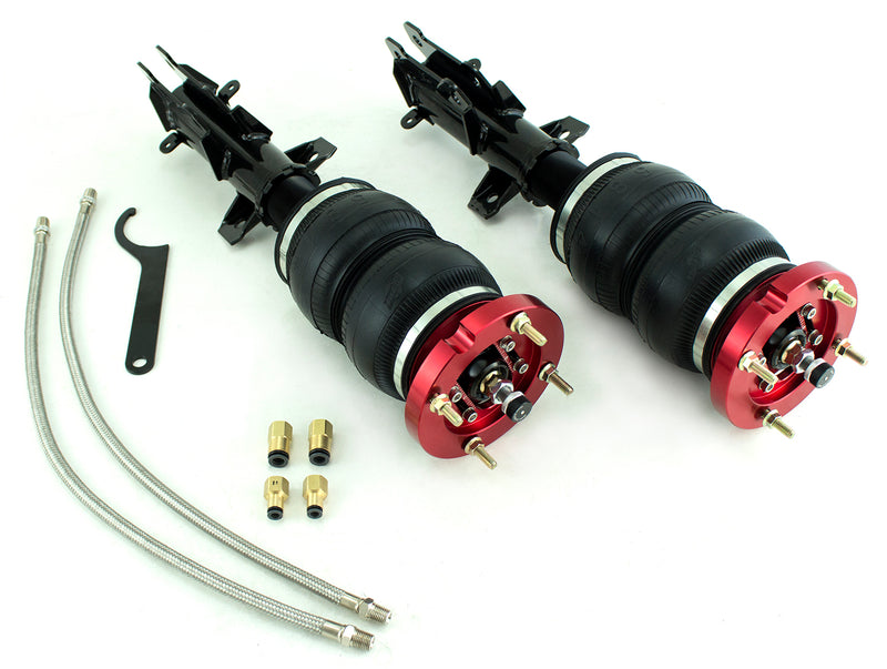 A pair of Air Lift Performance anodized red aluminum accented threaded monotube struts with double bellows progressive rate air springs with adjustable camber plates and powdercoated gloss black steel mounting brackets. A pair of braided stainless steel leader hoses and fittings. Air suspension kit part