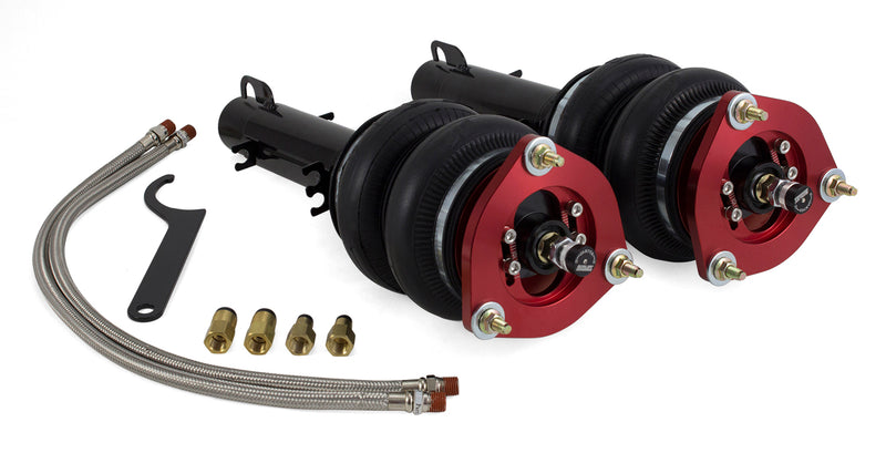 A pair of Air Lift Performance red accented monotube struts with double bellows progressive rate air springs, bolt-in camber plates and powdercoated gloss black steel brackets. A pair of braided stainless steel leader hoses and fittings. Air suspension kit
