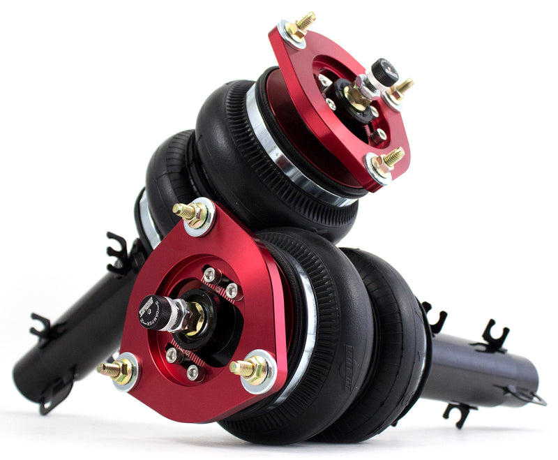 A pair of Air Lift Performance red accented monotube struts with double bellows progressive rate air springs, bolt-in camber plates and powdercoated gloss black steel brackets. Air suspension kit