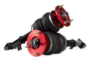 A pair of Air Lift Performance threaded monotube struts with double bellows progressive rate air springs with anodized red aluminum accents and mounting brackets.  Air suspension part