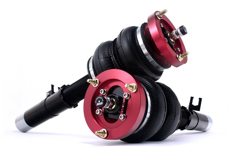 A pair of Air Lift Performance red accented high performance threaded monotube struts with anodized aluminum accented double bellows progressive rate air springs with bolt-in camber plates.  Air suspension kit part