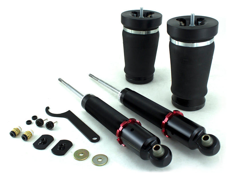 A pair of Air Lift Performance red accented monotube struts with progressive rate, tapered sleeve rear springs and installation fittings. Air suspension part