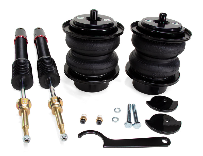 A pair of Air Lift Performance red accented monotube shocks and a pair of black double bellows progressive rate air springs along with roll plates, gloss black powdercoated mounting brackets and fittings. Air suspension kit part