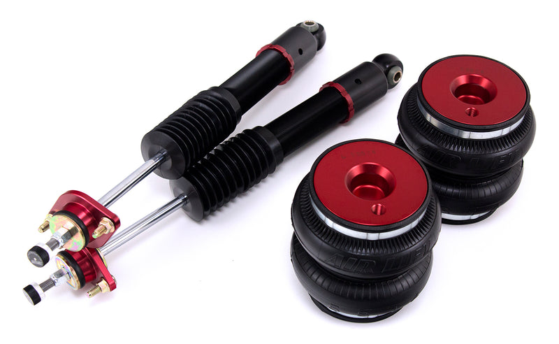 A pair of Air Lift Performance red accented high performance monotube shocks and double bellows progressive rate air springs. Air suspension kit part