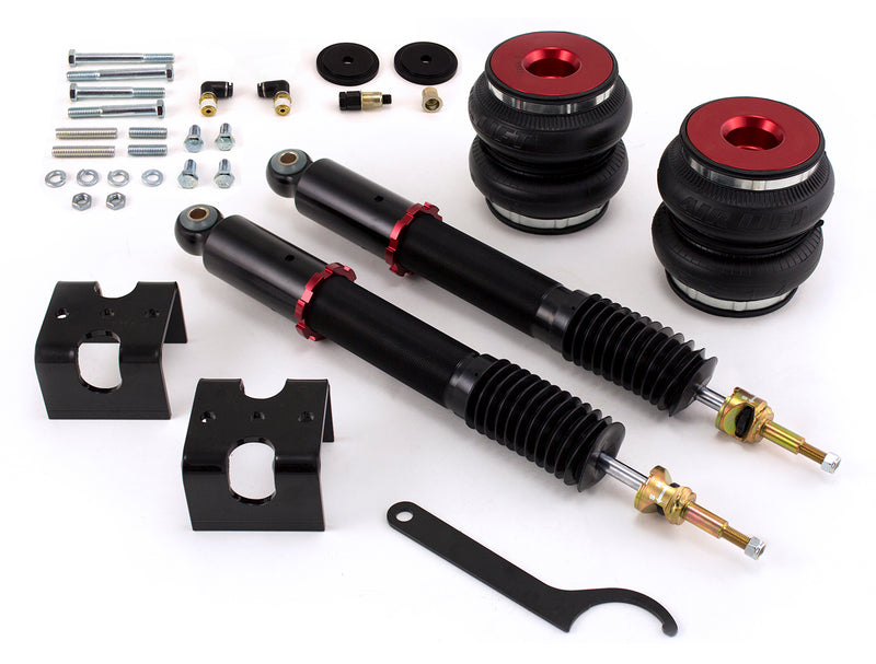 A pair of Air Lift Performance red accented threaded body air-over monotube shocks and double bellows progressive rate air springs along with mounting hardware and fitments. Air suspension kit part