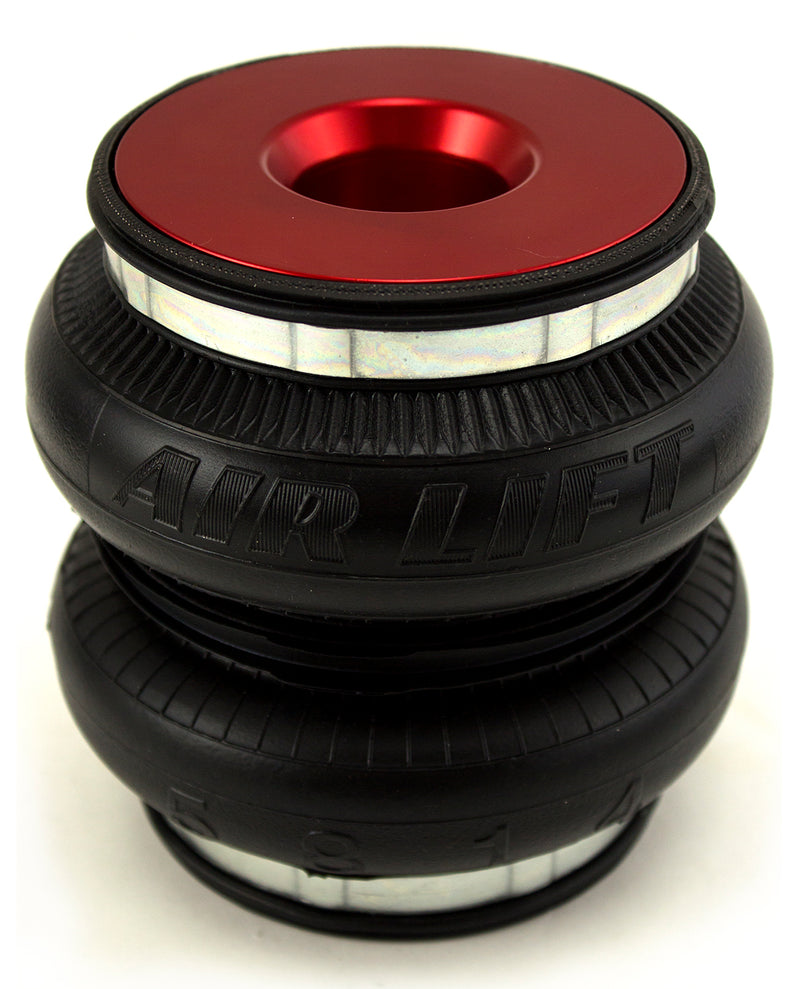 An  Air Lift Performance red accented double bellows progressive rate air spring.