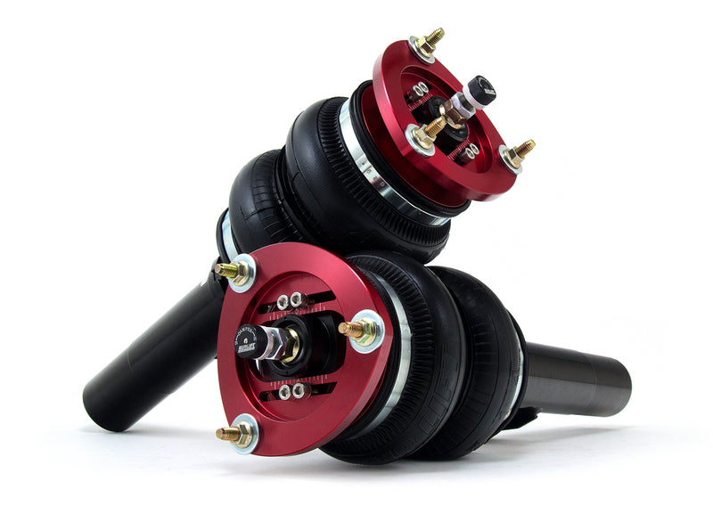 A pair of Air Lift Performance red accented threaded body air-over monotube shocks with double bellows progressive rate air springs and powdercoated gloss black steel brackets. Air suspension kit part