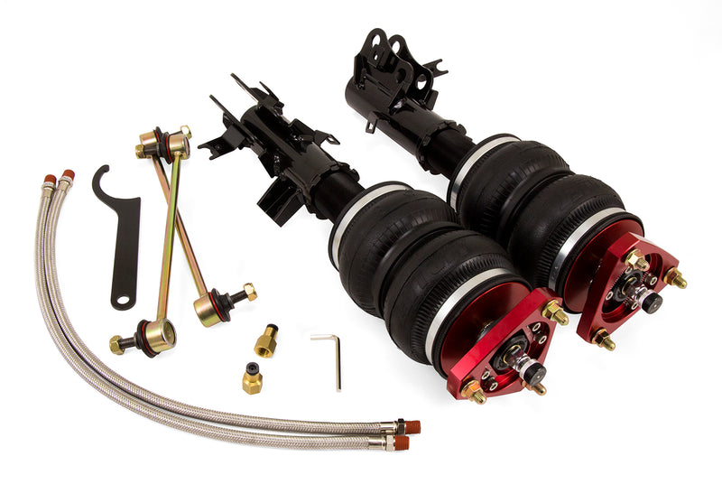 A pair of Air Lift Performance red accented threaded high performance monotube struts with double bellows progressive rate air springs with bolt-in camber plates, sway bar endlinks and braided stainless steel leader hoses. Air suspension kit part